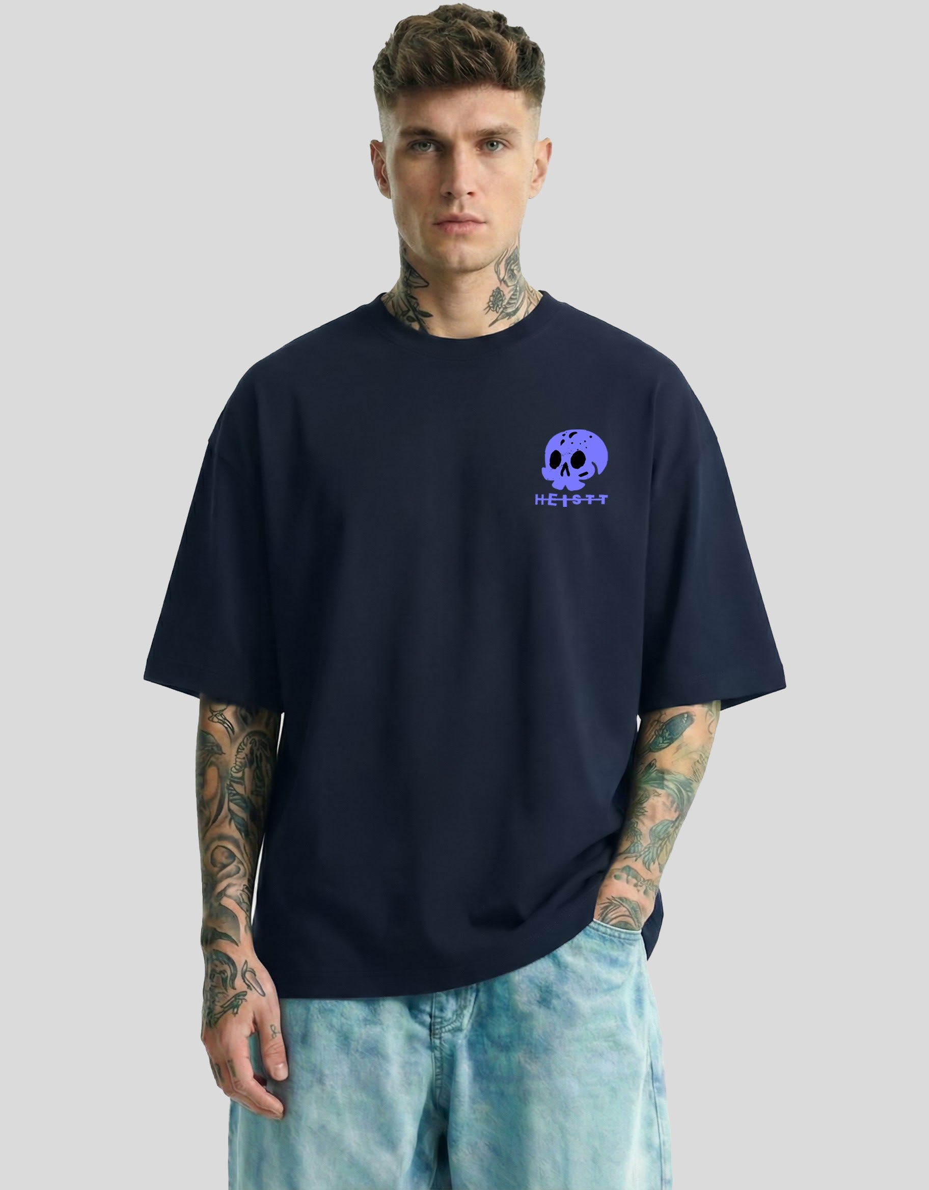 Navy blue oversized tee front view with purple skull logo and HEISTT text - street culture Heistt streetwear