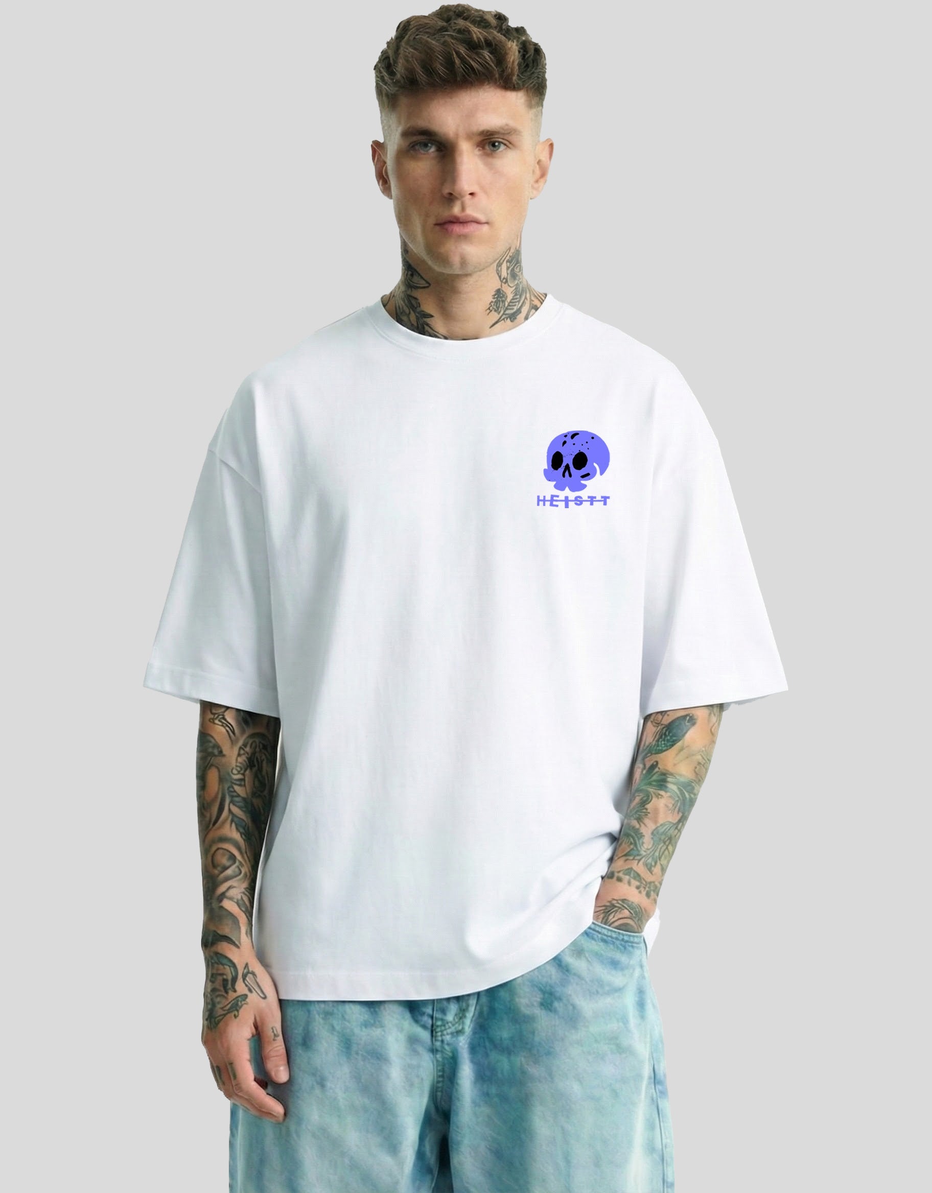 White oversized tee front view with purple skull logo and HEISTT text - street culture Heistt streetwear